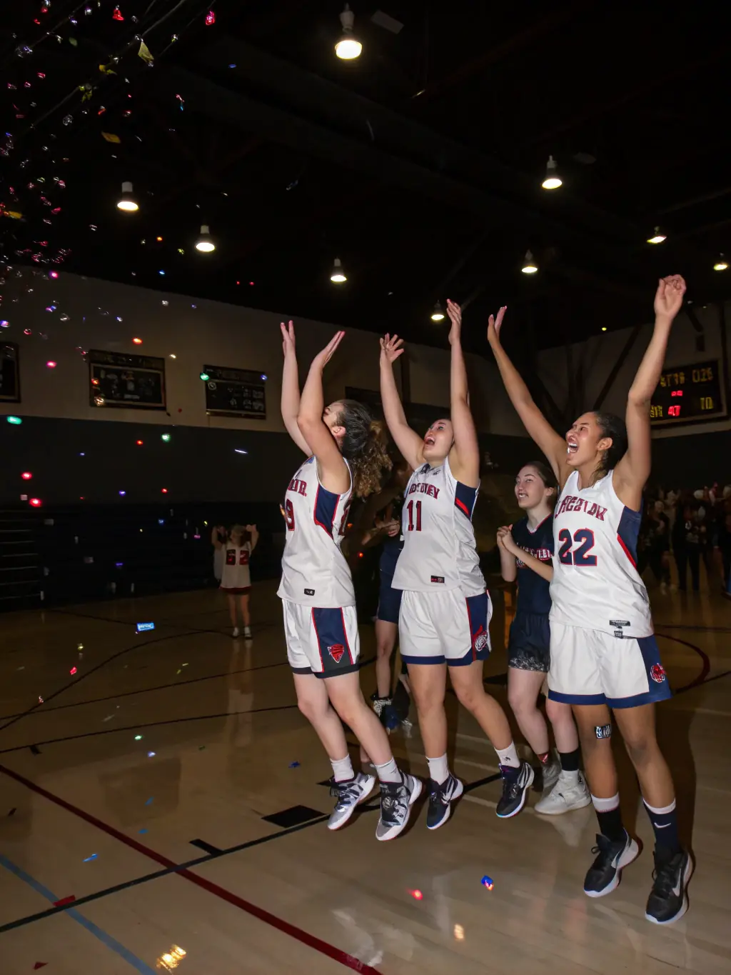 A photo of a BHNM handball team celebrating a victory, showing their camaraderie and sportsmanship.